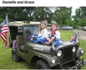 Two girls sitting in a jeep with the words " danielle and grace ".