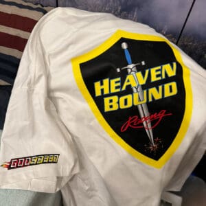A white jacket with a yellow and black patch on it